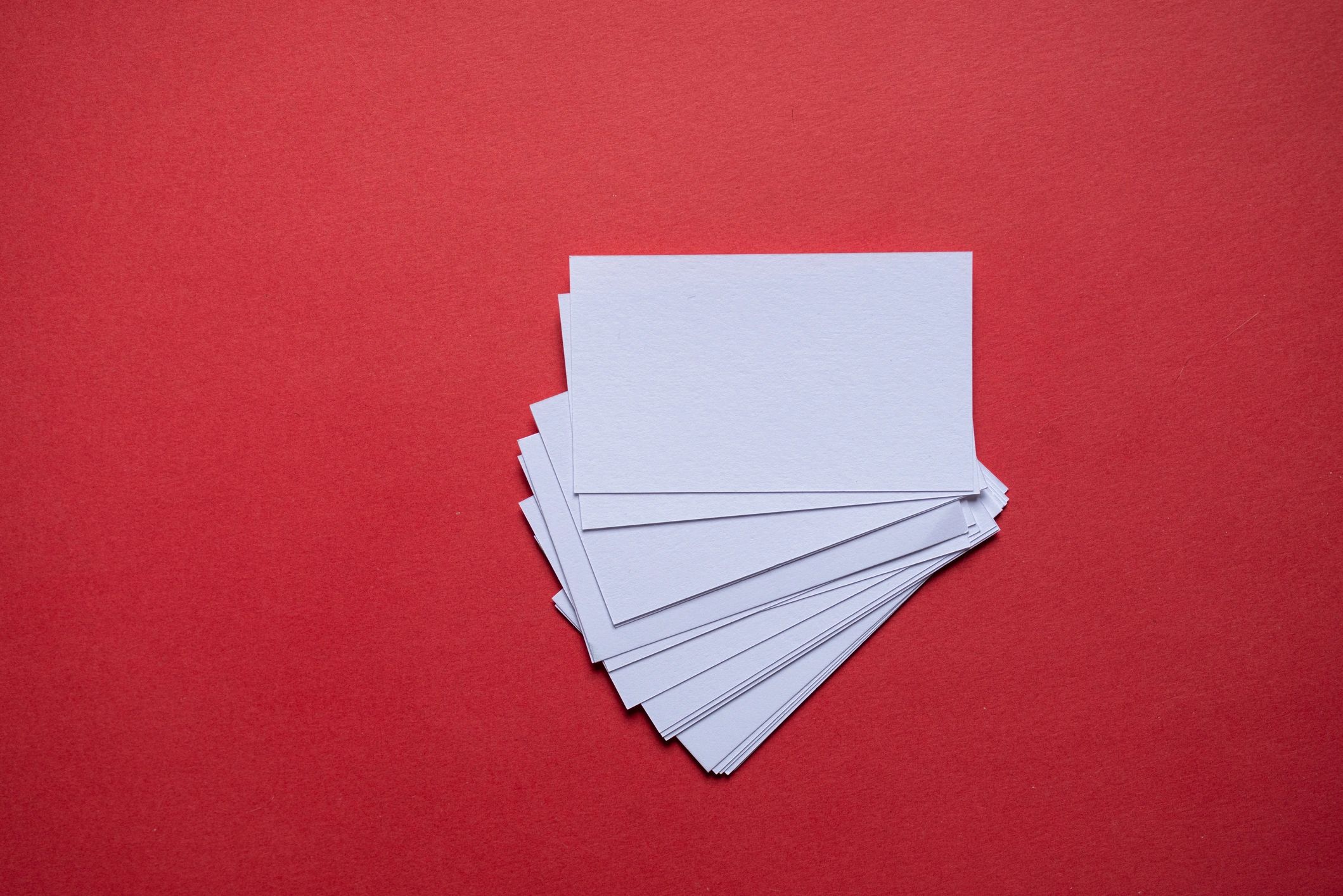 Business card sample on a bold red background