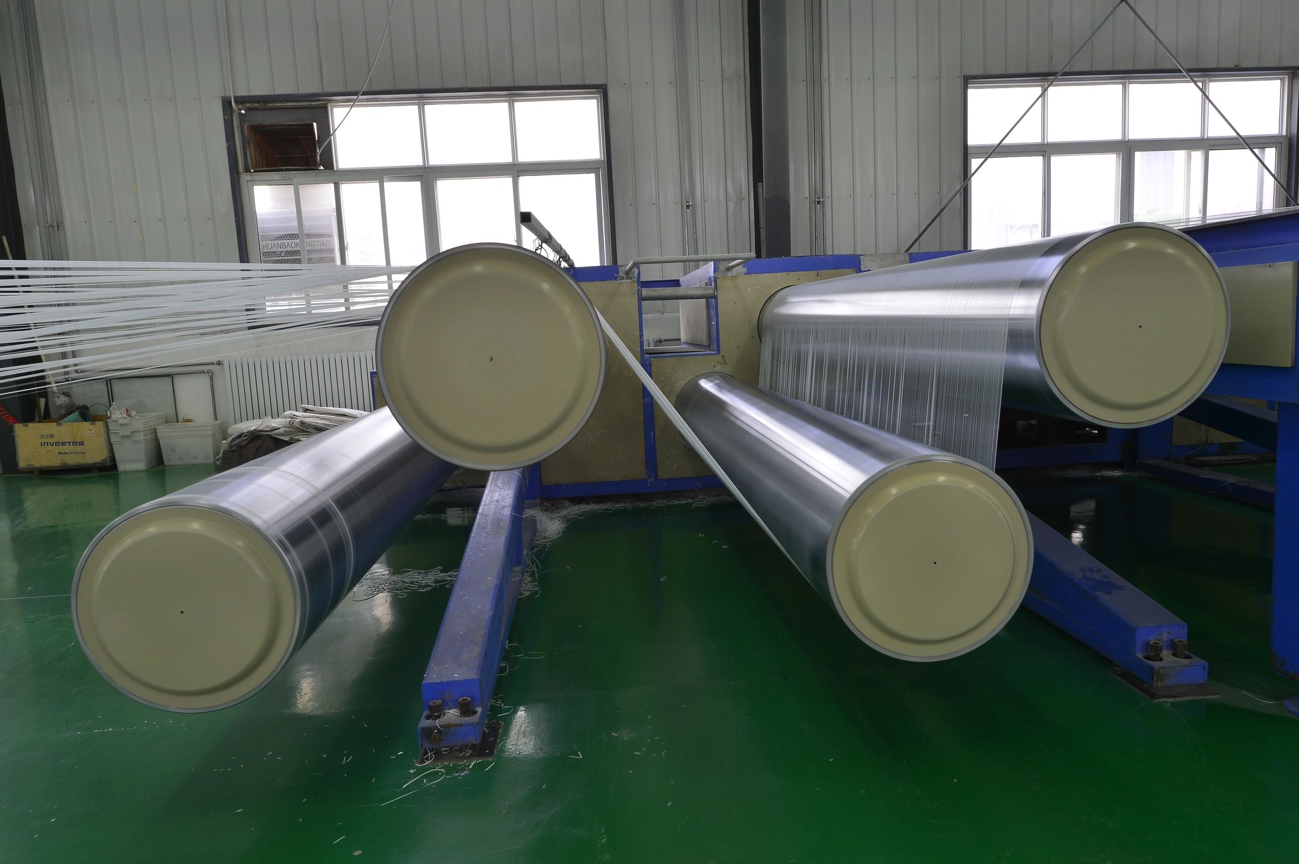 Large format production equipment in a print facility